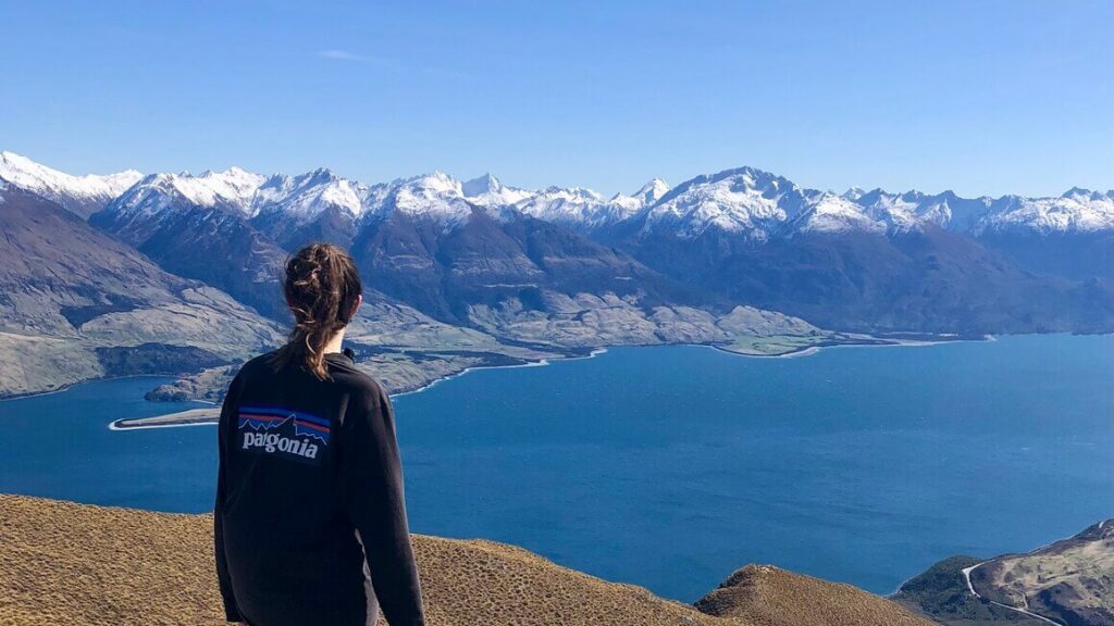 dani looking over mountains on a hike in south island, new zealand